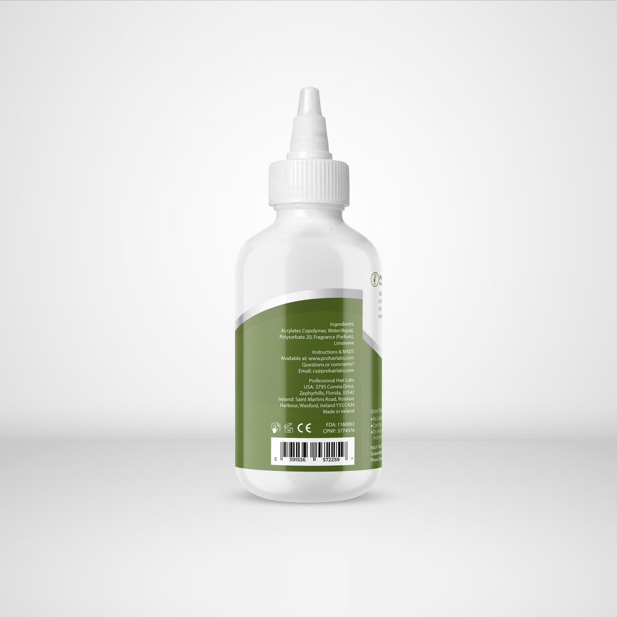 Bottle with a green label on a white background