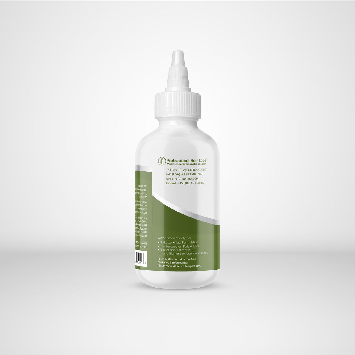 White bottle with a green label on a white background