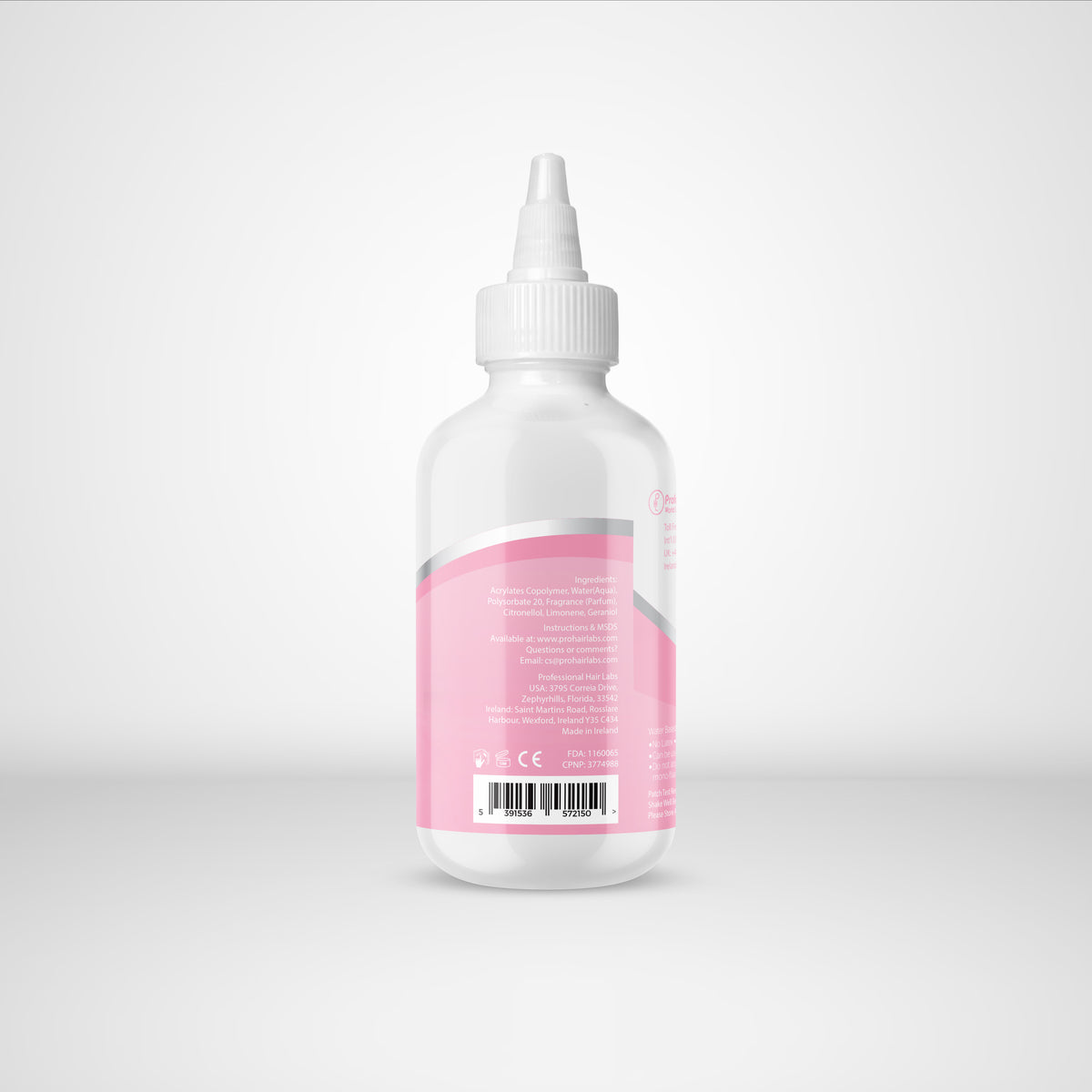 Bottle with a pink label on a white background