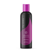Shampoo bottle with purple label on a white background