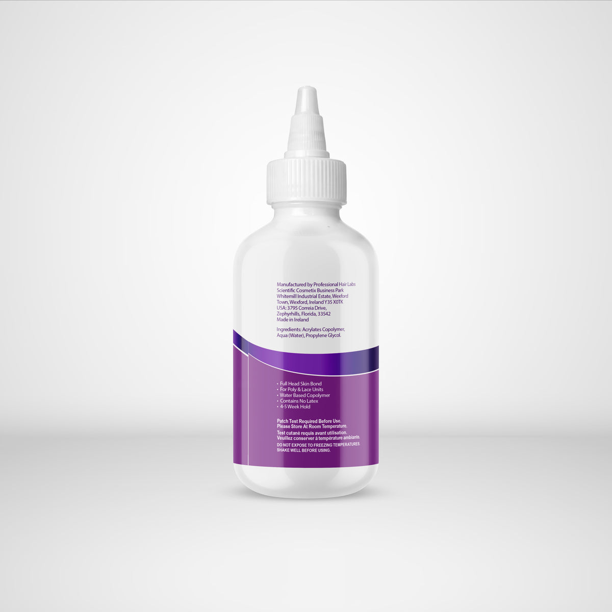 White bottle with a purple label on a light gray background